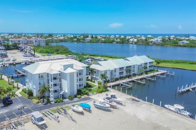 birds eye view of property featuring a water view