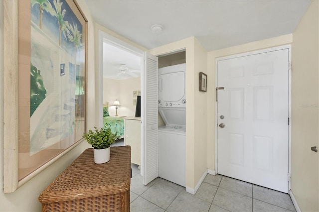 interior space featuring stacked washer and dryer