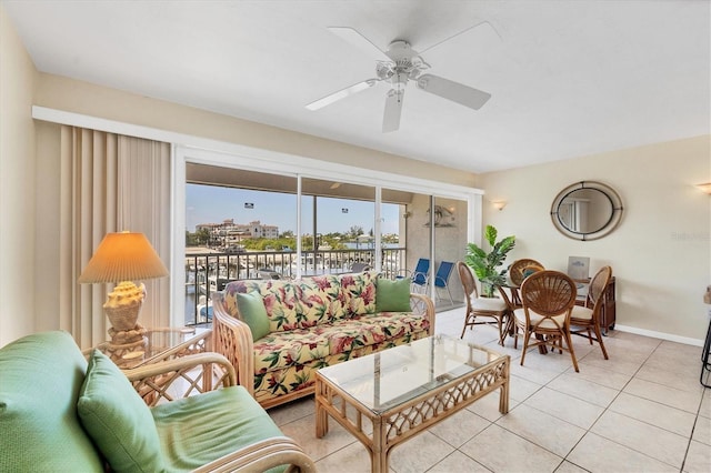 tiled living room with ceiling fan