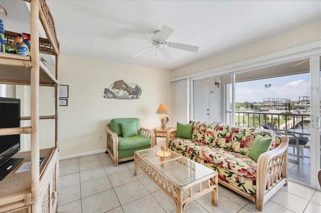 tiled living room featuring ceiling fan