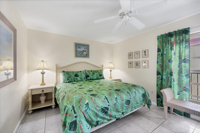 7070 Placida Rd Unit 1221, Placida, FL 33946 - bedroom with tile patterned flooring, baseboards, and a ceiling fan