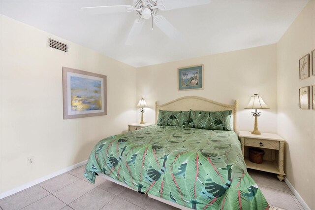 bedroom featuring light tile patterned floors and ceiling fan