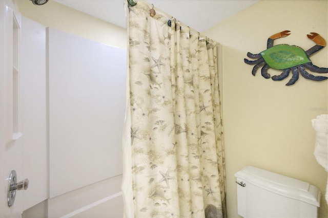 7070 Placida Rd Unit 1221, Placida, FL 33946 - bathroom with shower / tub combo and toilet