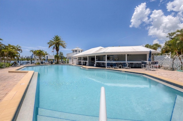 view of swimming pool featuring a patio