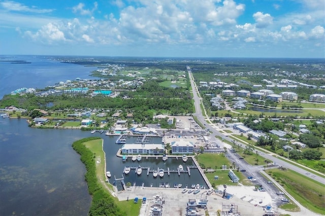 birds eye view of property featuring a water view