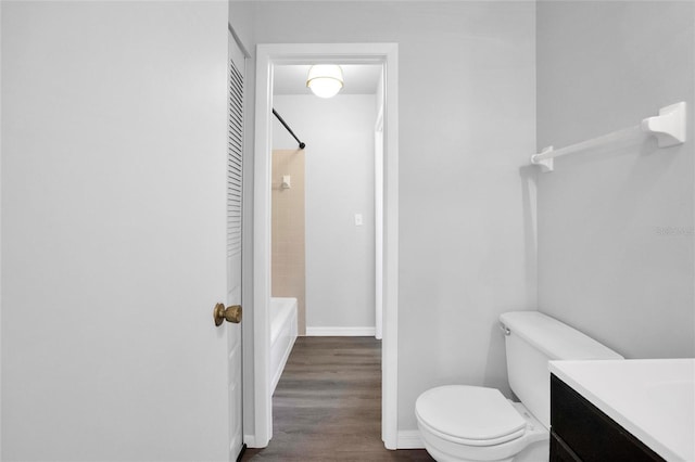 full bathroom featuring vanity, toilet, shower / bathing tub combination, and wood-type flooring