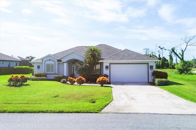 ranch-style home featuring a garage and a front yard