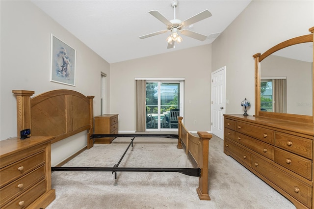 bedroom with light colored carpet, vaulted ceiling, and ceiling fan