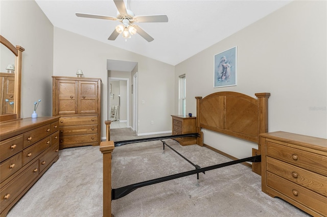 carpeted bedroom with lofted ceiling and ceiling fan