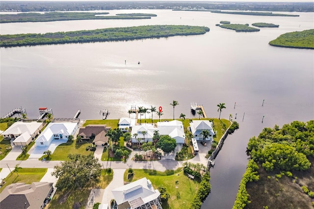 drone / aerial view with a water view