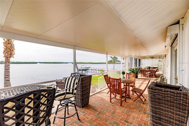 view of patio / terrace with a water view