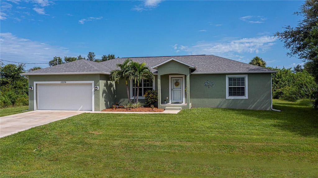 ranch-style house with a garage, concrete driveway, roof with shingles, stucco siding, and a front lawn