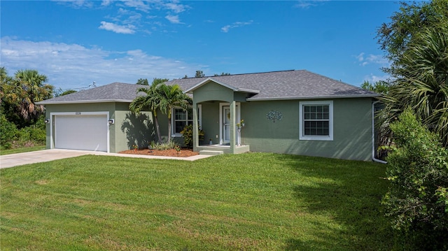 single story home with an attached garage, a front yard, concrete driveway, and stucco siding