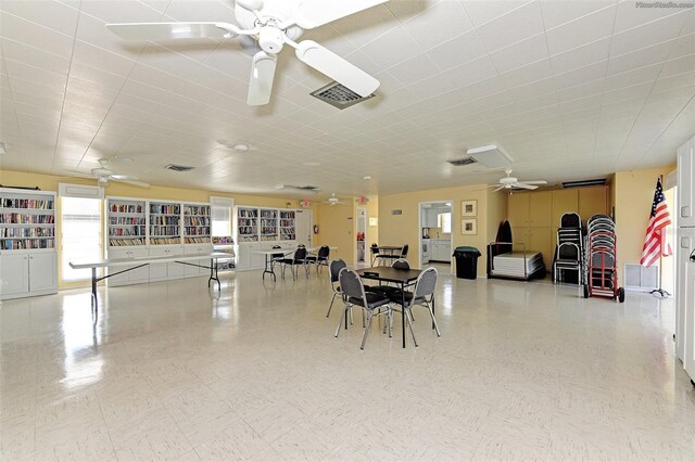 dining space featuring ceiling fan