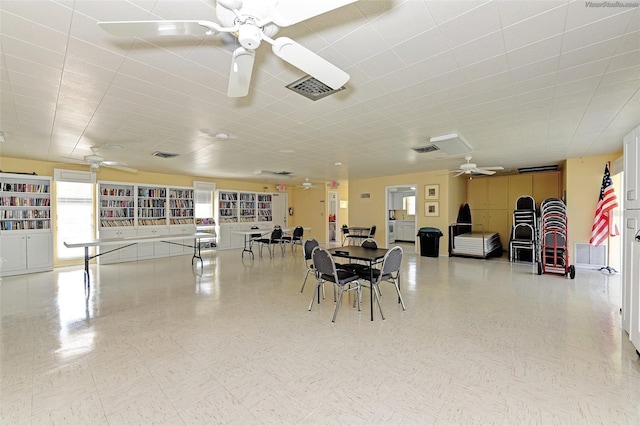 dining space featuring ceiling fan