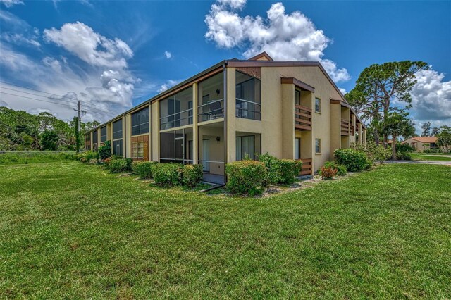 exterior space featuring a yard