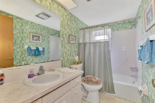 full bathroom featuring a textured ceiling, toilet, shower / bath combination with curtain, tile patterned flooring, and vanity