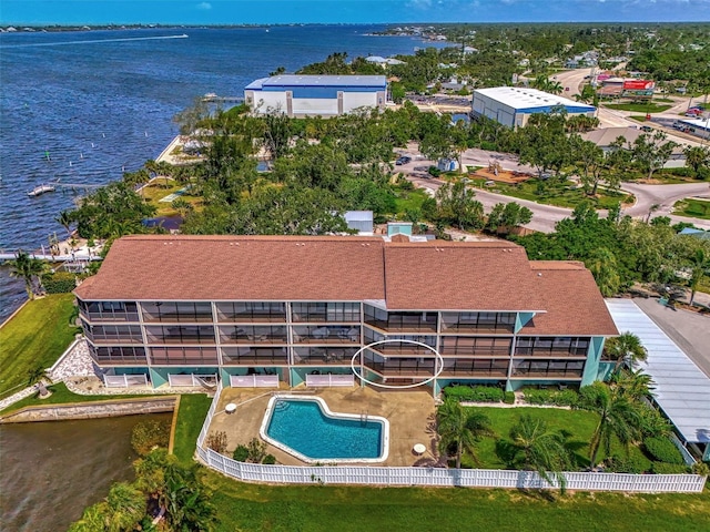 birds eye view of property featuring a water view