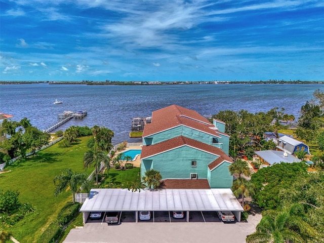 drone / aerial view featuring a water view