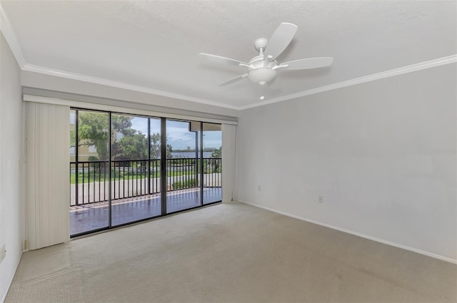 unfurnished room with light carpet, crown molding, baseboards, and ceiling fan