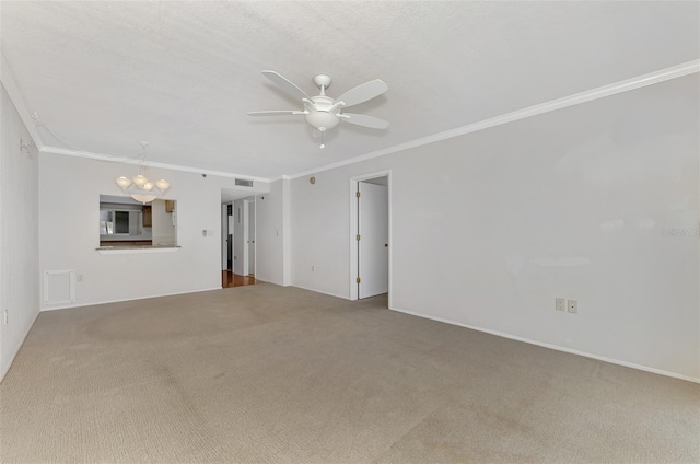 unfurnished living room with carpet flooring, ceiling fan with notable chandelier, and crown molding