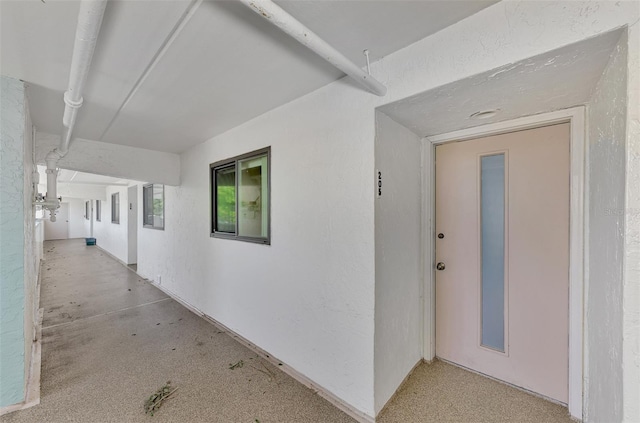 doorway to property with a patio