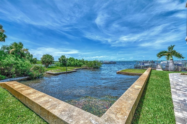 dock area featuring a water view