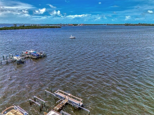 view of dock with a water view and boat lift