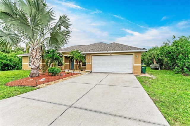 ranch-style home with a front lawn and a garage