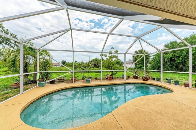 view of pool featuring a patio and a lanai