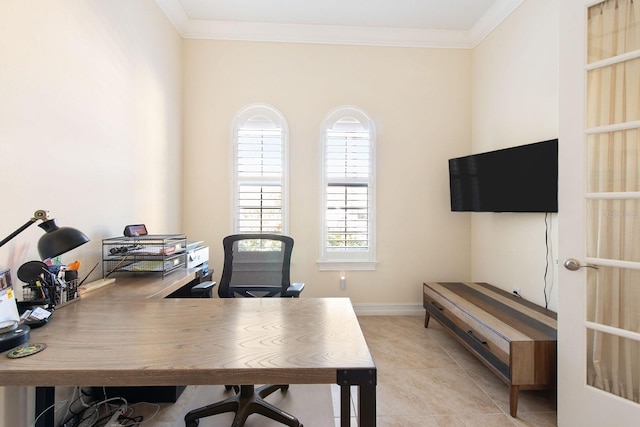 home office with crown molding, baseboards, and light tile patterned floors