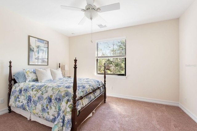 bedroom with carpet, visible vents, and baseboards