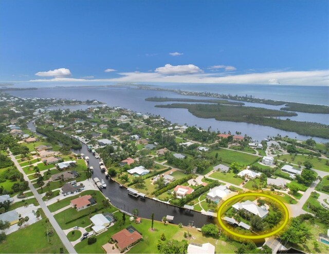 bird's eye view with a water view