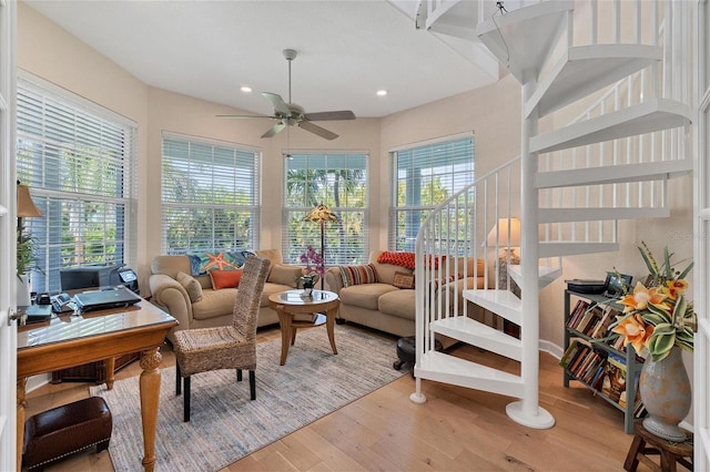 sunroom / solarium with ceiling fan