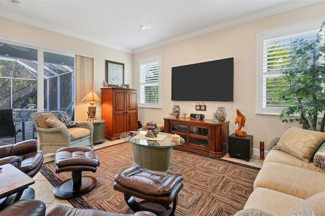 living room with ornamental molding and a wealth of natural light