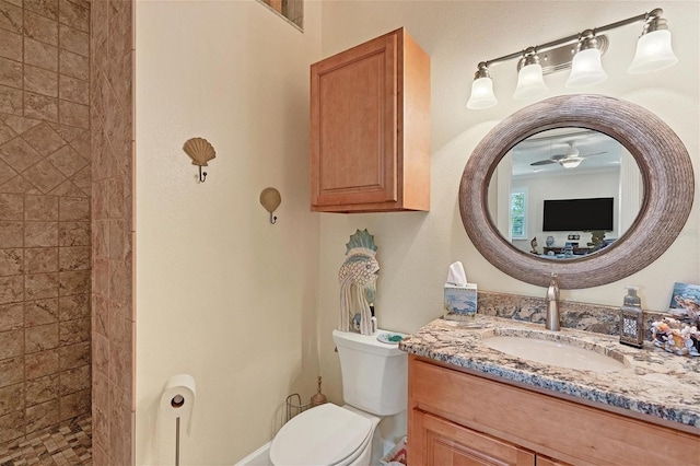 bathroom with toilet and vanity