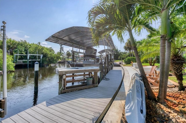 dock area with a water view