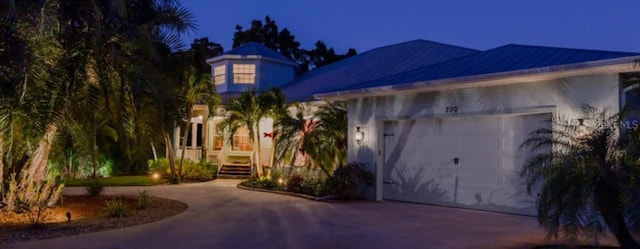 view of front of property featuring a garage