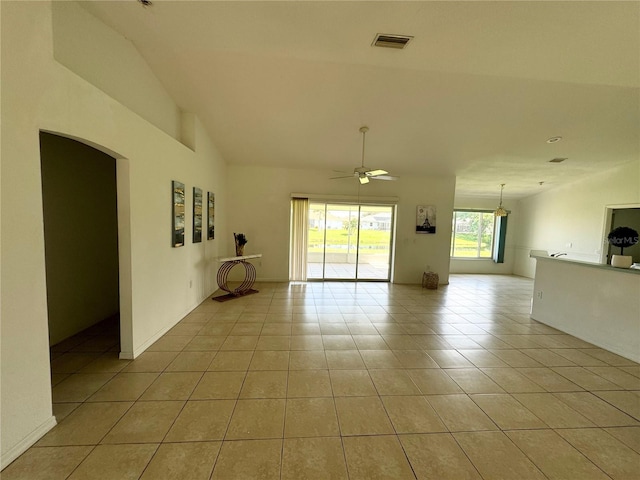 interior space with ceiling fan and lofted ceiling