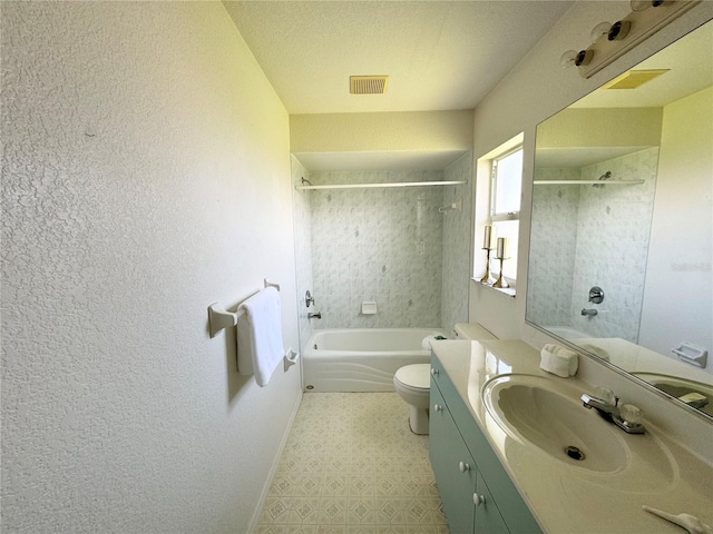 full bath featuring visible vents, baseboards, toilet, vanity, and shower / bathtub combination