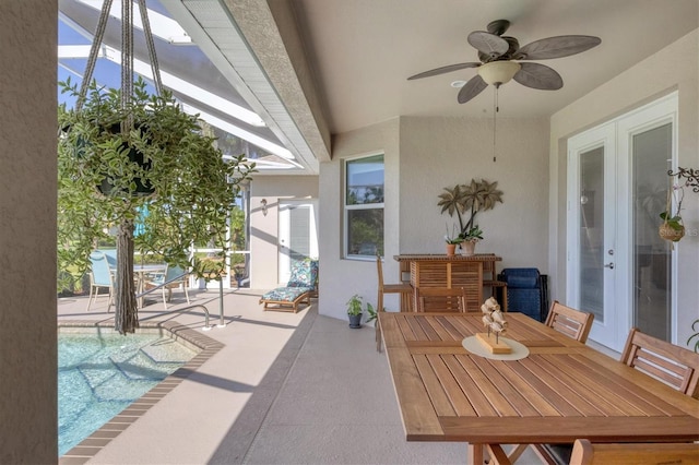 view of patio / terrace with ceiling fan and french doors