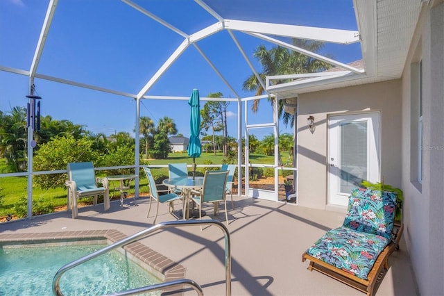 view of patio with a lanai and an outdoor pool