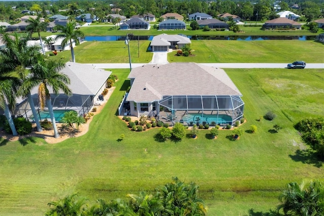 aerial view with a water view and a residential view