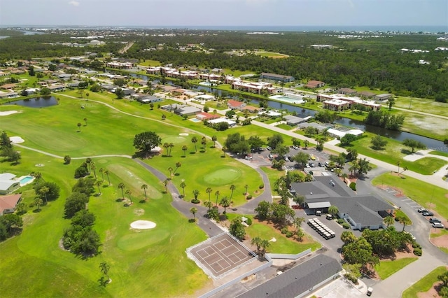 aerial view featuring a water view, a residential view, and golf course view