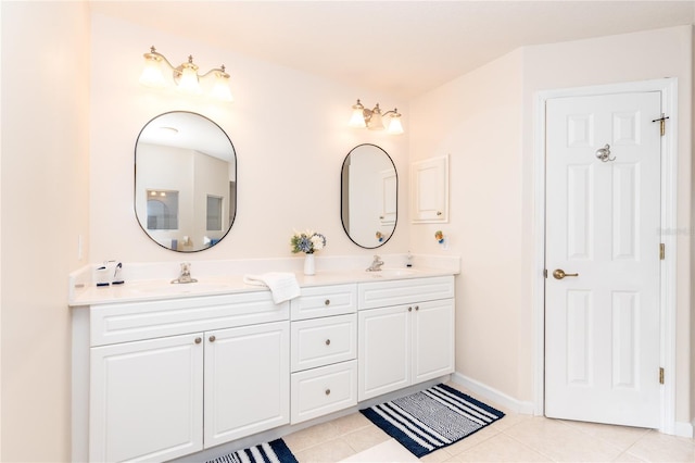 bathroom featuring tile patterned flooring and dual vanity