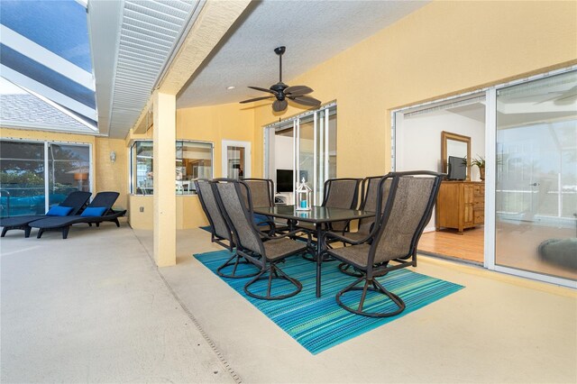 view of patio featuring ceiling fan