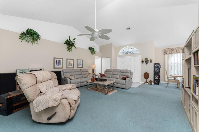 living room with ceiling fan, carpet, and high vaulted ceiling