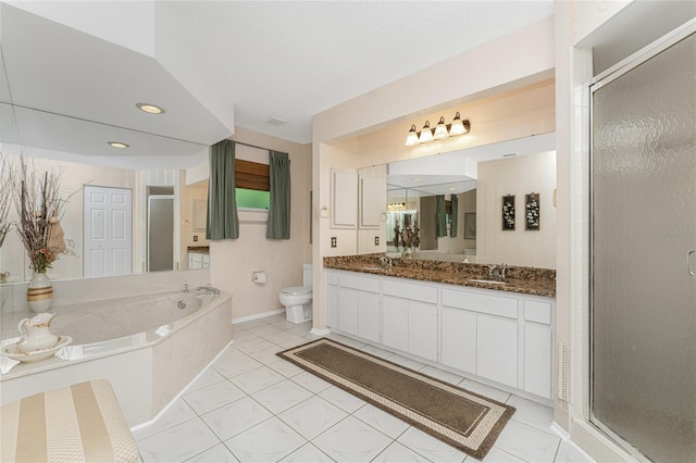 full bathroom featuring tile patterned floors, independent shower and bath, vanity, and toilet