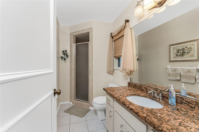 bathroom featuring an enclosed shower, a textured ceiling, tile patterned flooring, vanity, and toilet