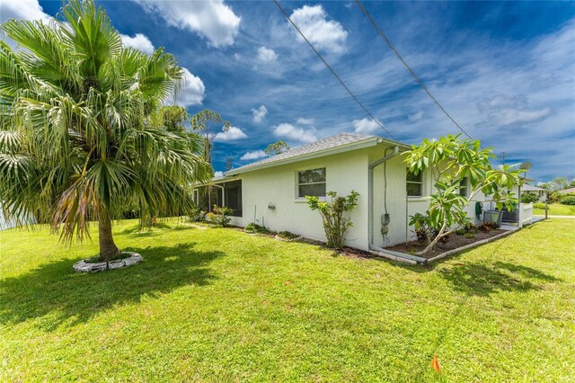 exterior space with a lawn